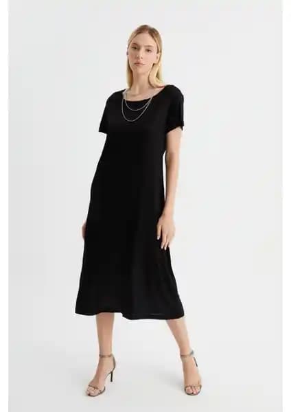 Alexander Gardi Elbise Karşılaştırması: Kısa Kollu Salaş ve Yırtmaçlı Modellerin Özellikleri