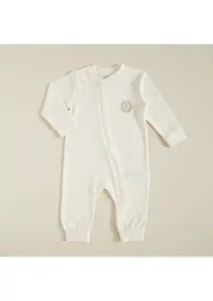 Bebek Tulumu Karşılaştırması: Chakra Organic Ekru ve DeFacto Köpek Baskılı Ürünlerin Özellikleri