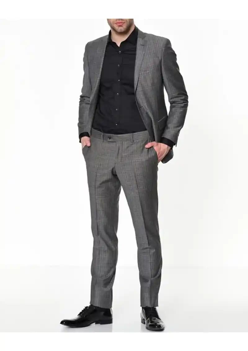 Beymen Business Takım Elbise: Şıklık ve Profesyonelliğin Modern Yansıması