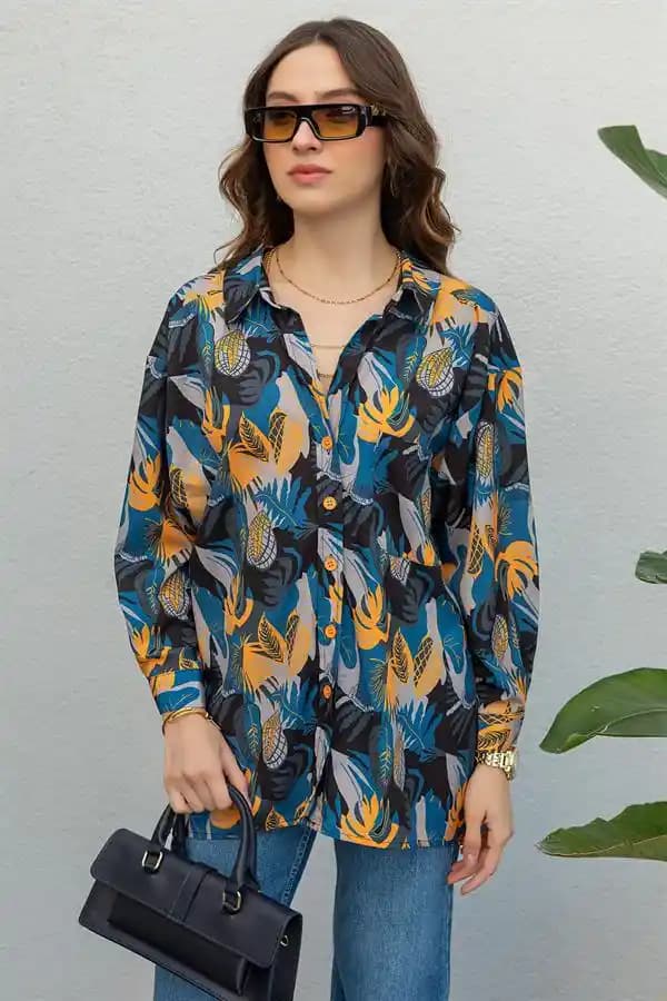Kadın Gömlek Çeşitleri ve Moda Trendleri: Şıklık ve Konforun Buluşması