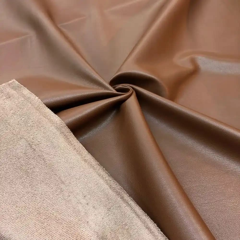 Kahverengi Deri Kumaş: Moda Endüstrisinde Zamansız ve Çok Yönlü Kullanım Rehberi