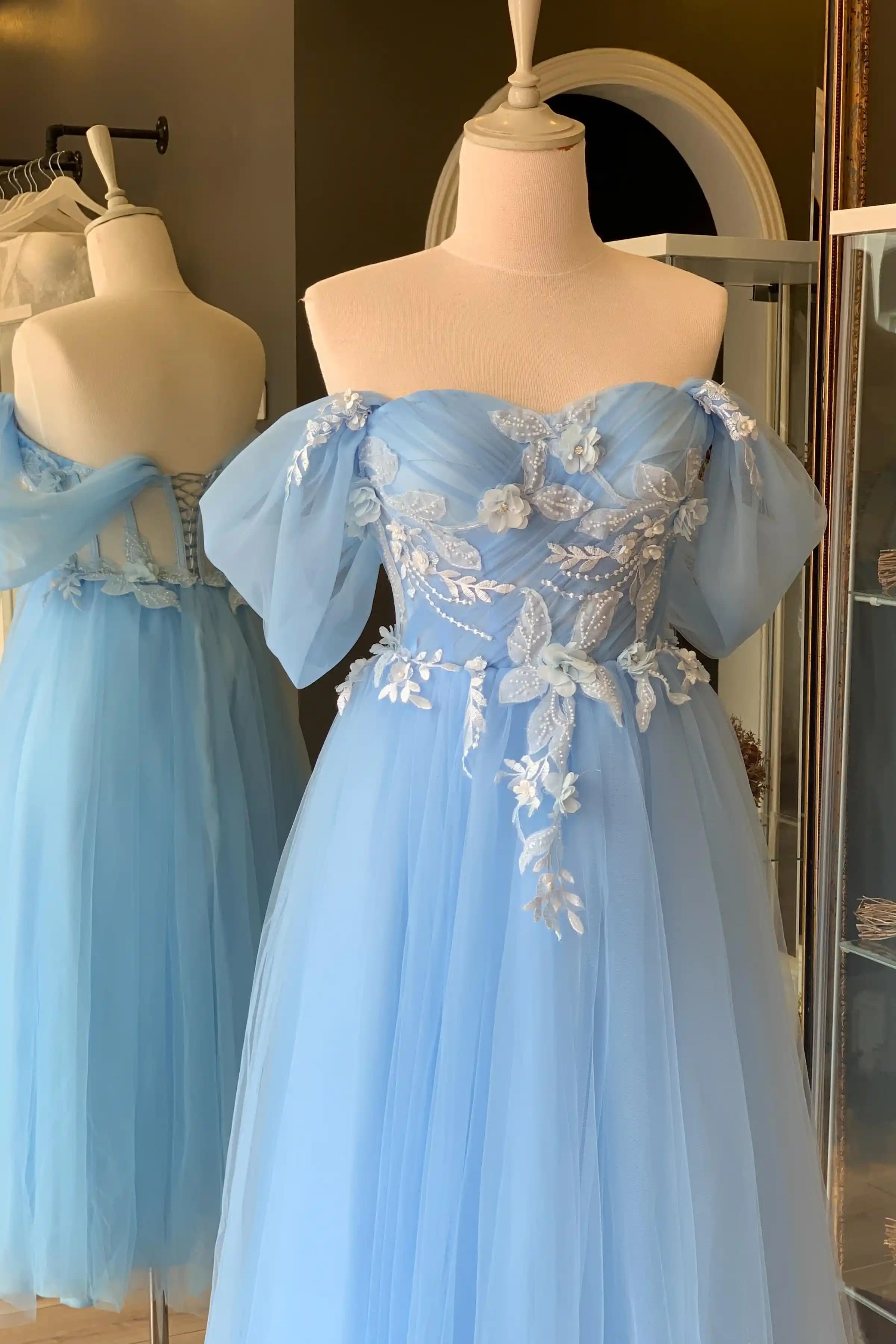 Mavi Balo Elbisesi: Moda Dünyasında Zarafet ve Şıklığın Temsilcisi