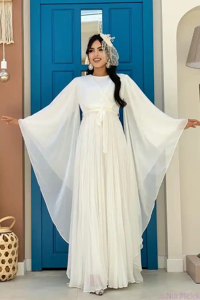 Nikah Elbisesi Seçiminde Trendler, Tarzlar ve Dikkat Edilmesi Gerekenler 2024
