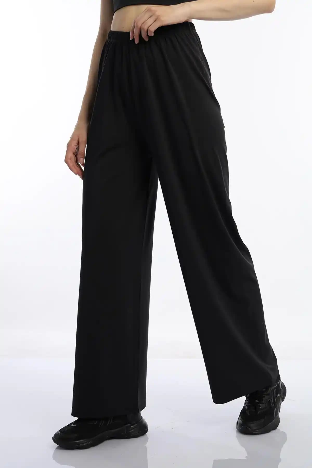 Oversize Kumaş Pantolonlar: Rahatlık ve Şıklığın Günümüz Moda Trendleri