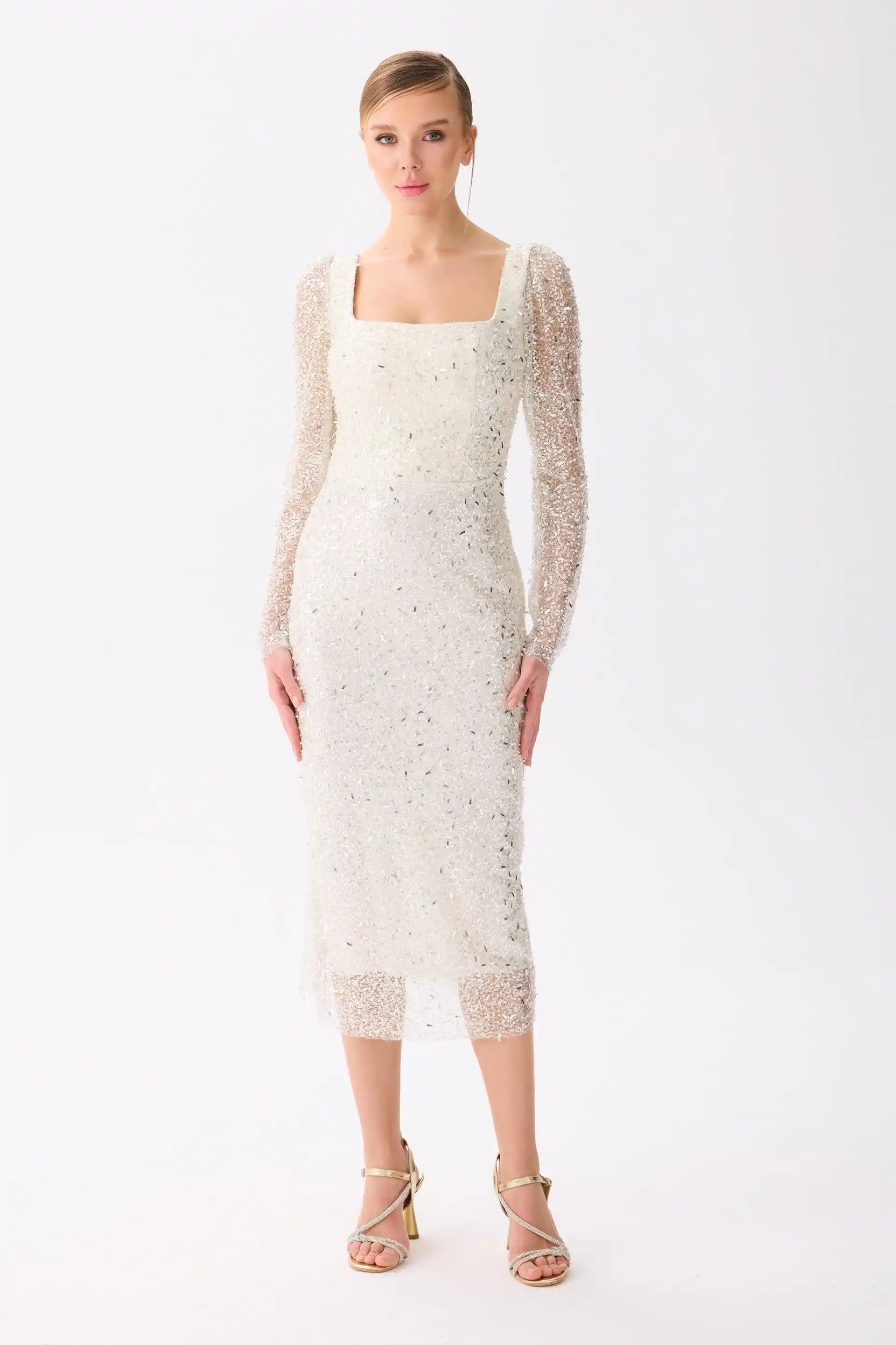 Uzun Kollu Nikah Elbisesi Trendleri ve Seçim İpuçlarıyla Şıklığınızı Yansıtın