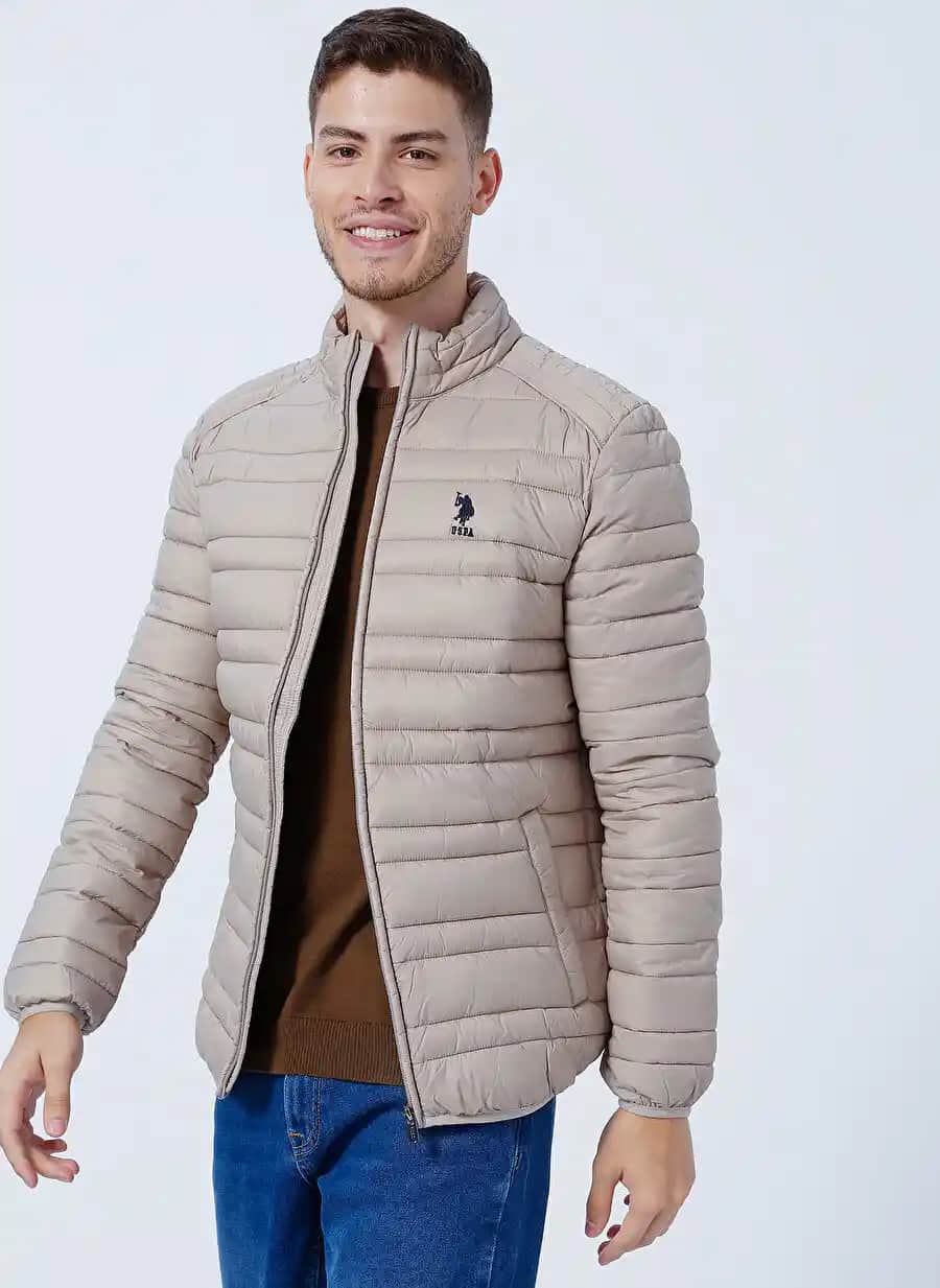 US Polo Erkek Şişme Montlar: Moda ve Fonksiyonelliğin Buluşması