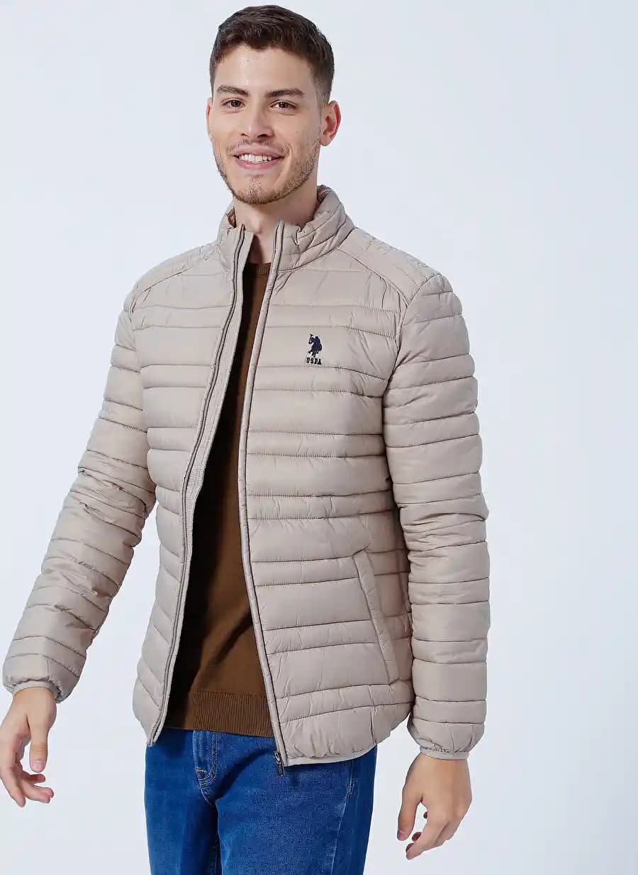 US Polo Erkek Şişme Montlar: Moda ve Fonksiyonelliğin Buluşması