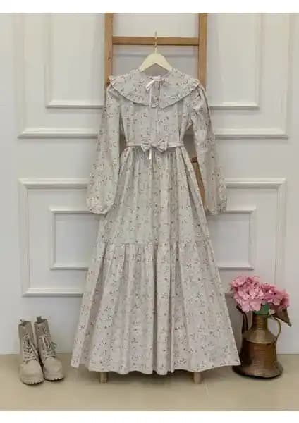 Küçüğüm Butik Tesettür Kat Kat Elbise Modern ve Feminen Tasarım Özellikleri