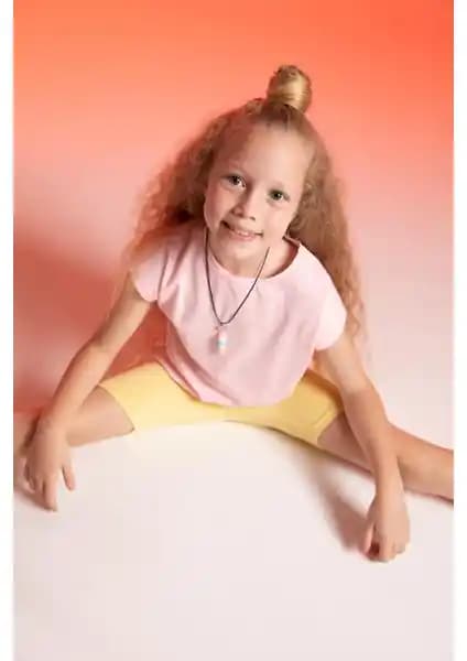 DeFacto Kız Çocuk Biker Tayt: Konfor ve Şıklığı Bir Arada Sunan Modern Tasarım