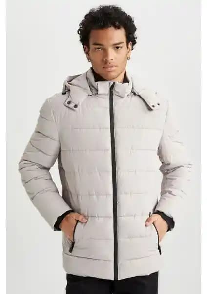 DeFacto Rüzgar Geçirmez Şişme Mont Erkekler İçin Şık ve Fonksiyonel Kış Giyim Seçeneği