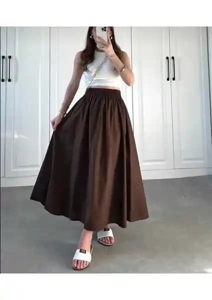 Moda Ulu Çift Cepli Beli Lastikli Uzun Etek: Günlük Şıklık ve Konfor Sunan Tasarım