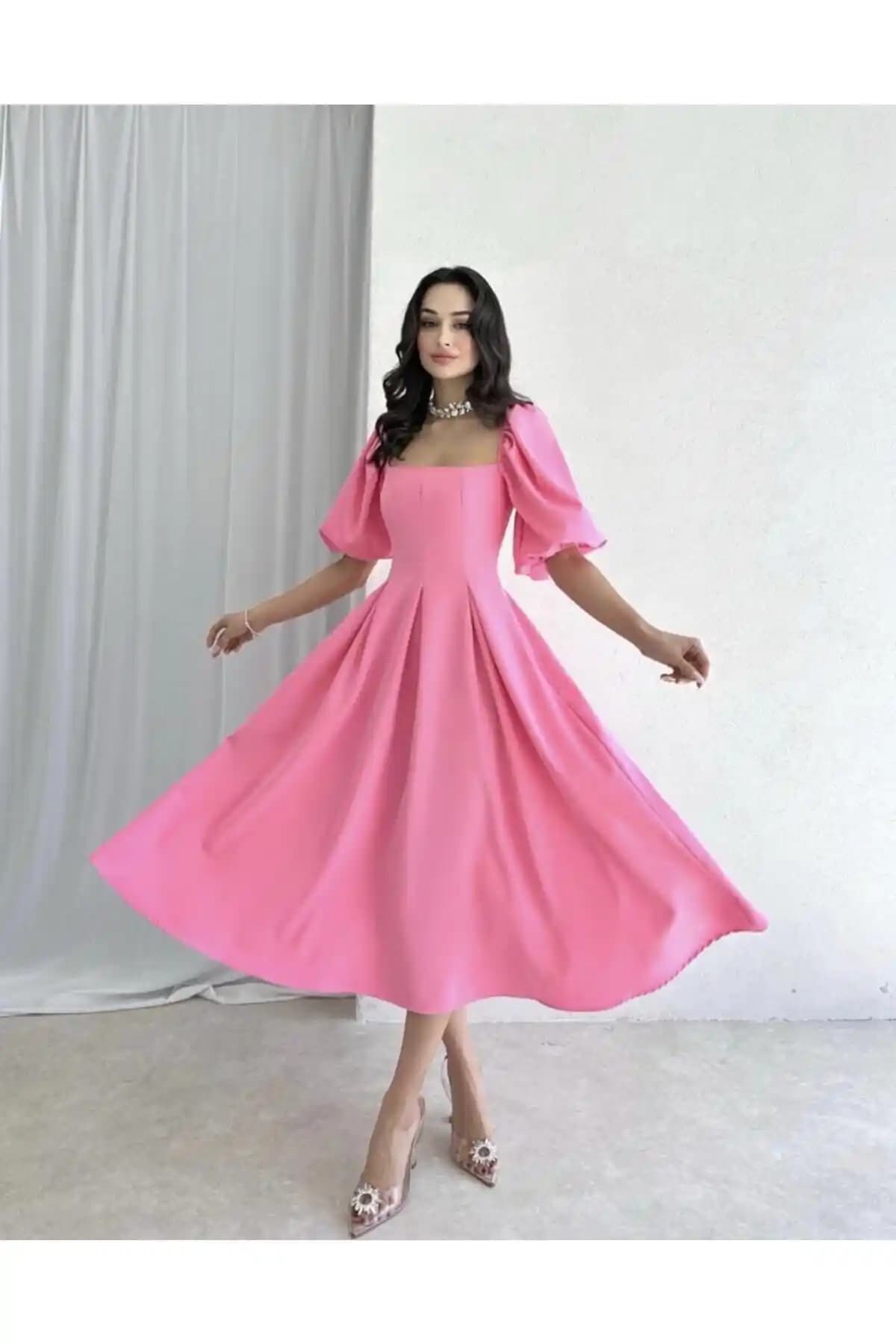 Afiş Butik Pembe Kare Yaka Balon Kollu Pileli Midi Elbise Şıklık ve Rahatlığı Bir Arada Sunar
