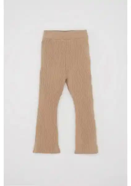 DeFacto Kız Bebek İspanyol Paça Fitilli Bej Triko Tayt: Konfor ve Şıklığın Mükemmel Buluşması