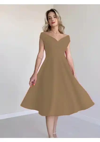 Kadınlar İçin Şık ve Rahat Kruvaze Yaka Volan Detaylı Krep Elbise Özellikleri ve Kullanım Alanları