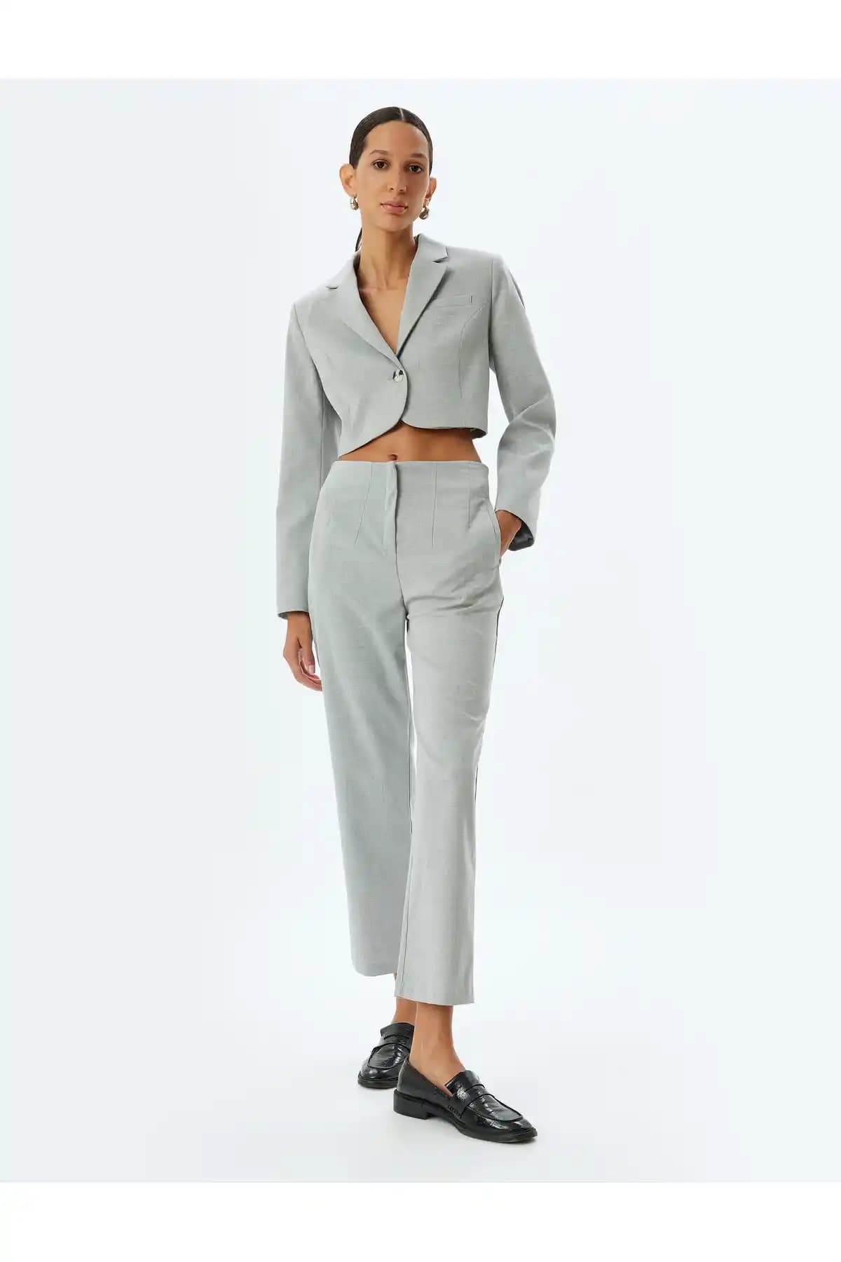 Koton Slim Fit Bel Cepli Cigarette Pantolon: Şıklık ve Konforun Modern Buluşması