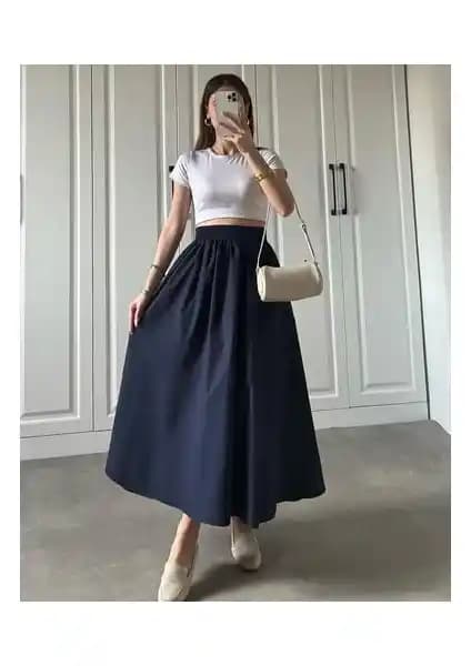 Moda Ulu Çift Cepli Beli Lastikli Uzun Etek: Şıklık ve Fonksiyonellik Bir Arada