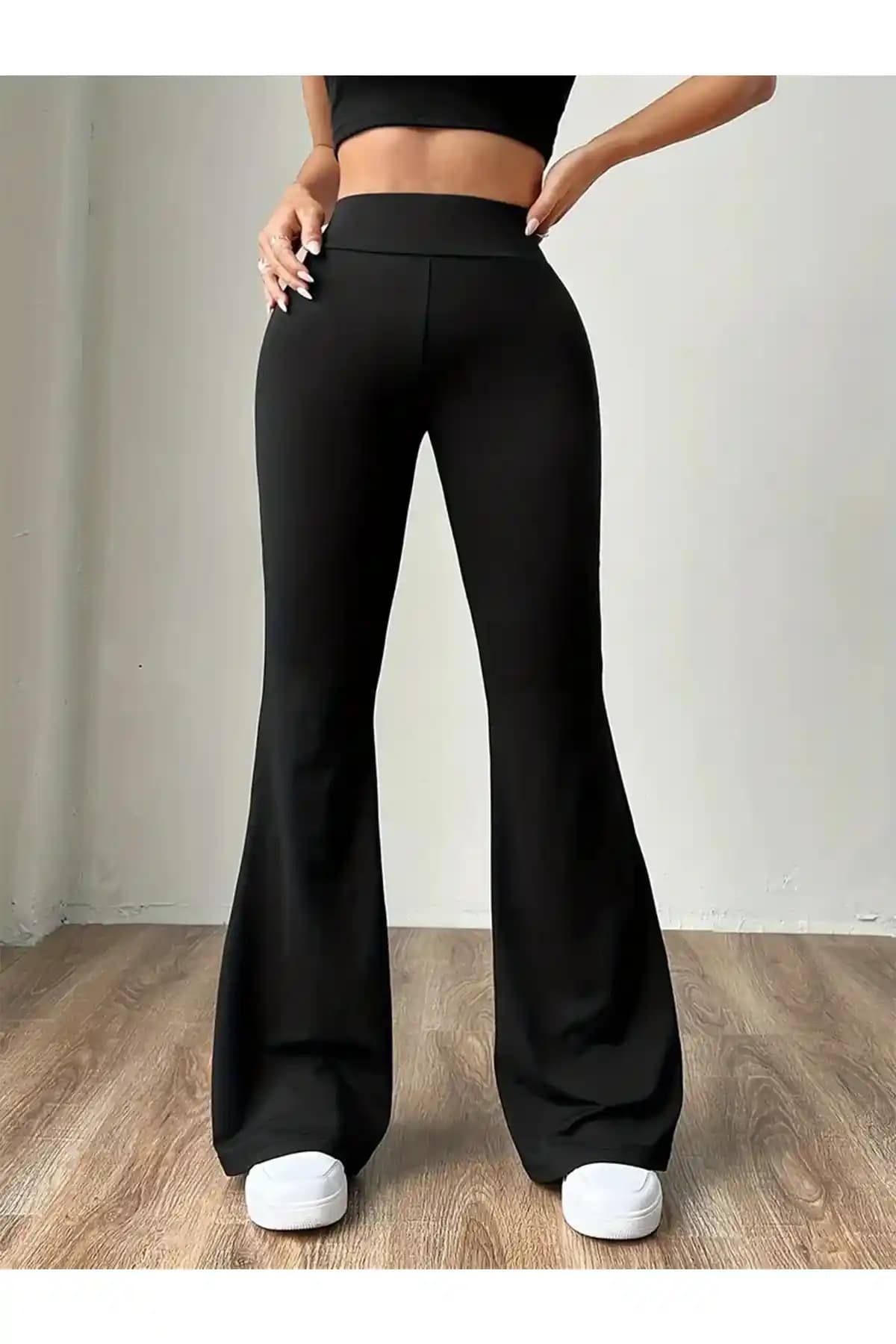 Siyah Yüksek Bel İspanyol Paça Tayt Pantolon: Günlük Şıklık ve Konforun Modern Bir Yansıması