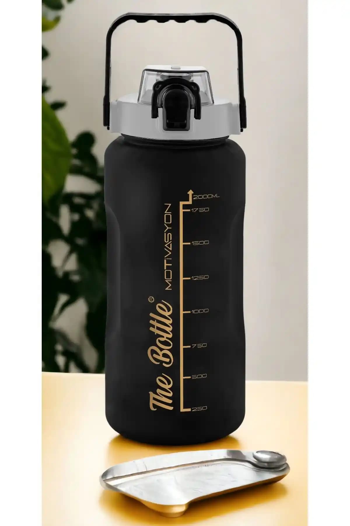 Comprox Motivasyonel Su Matarası 2000 ml dayanıklı ve şık tasarım ile günlük su içme alışkanlığı sağlar